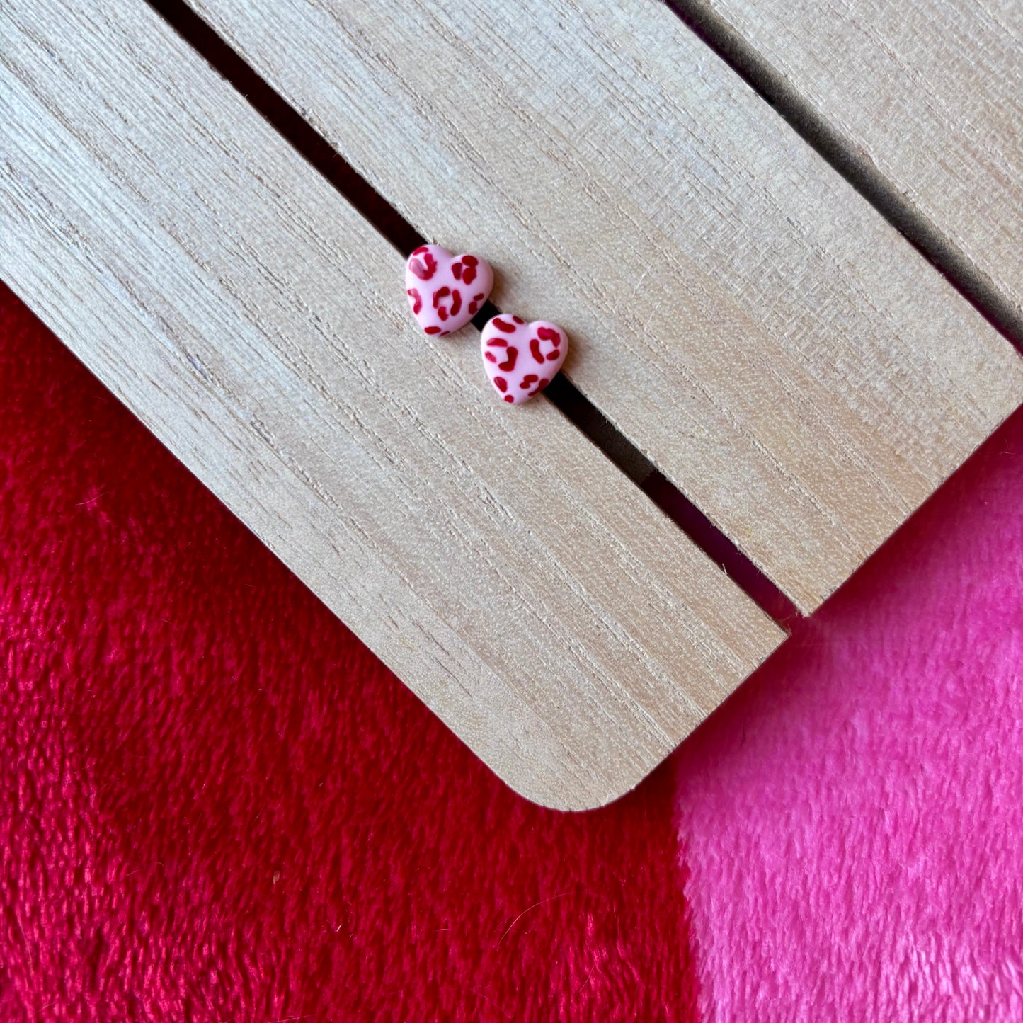 Pink/red studs