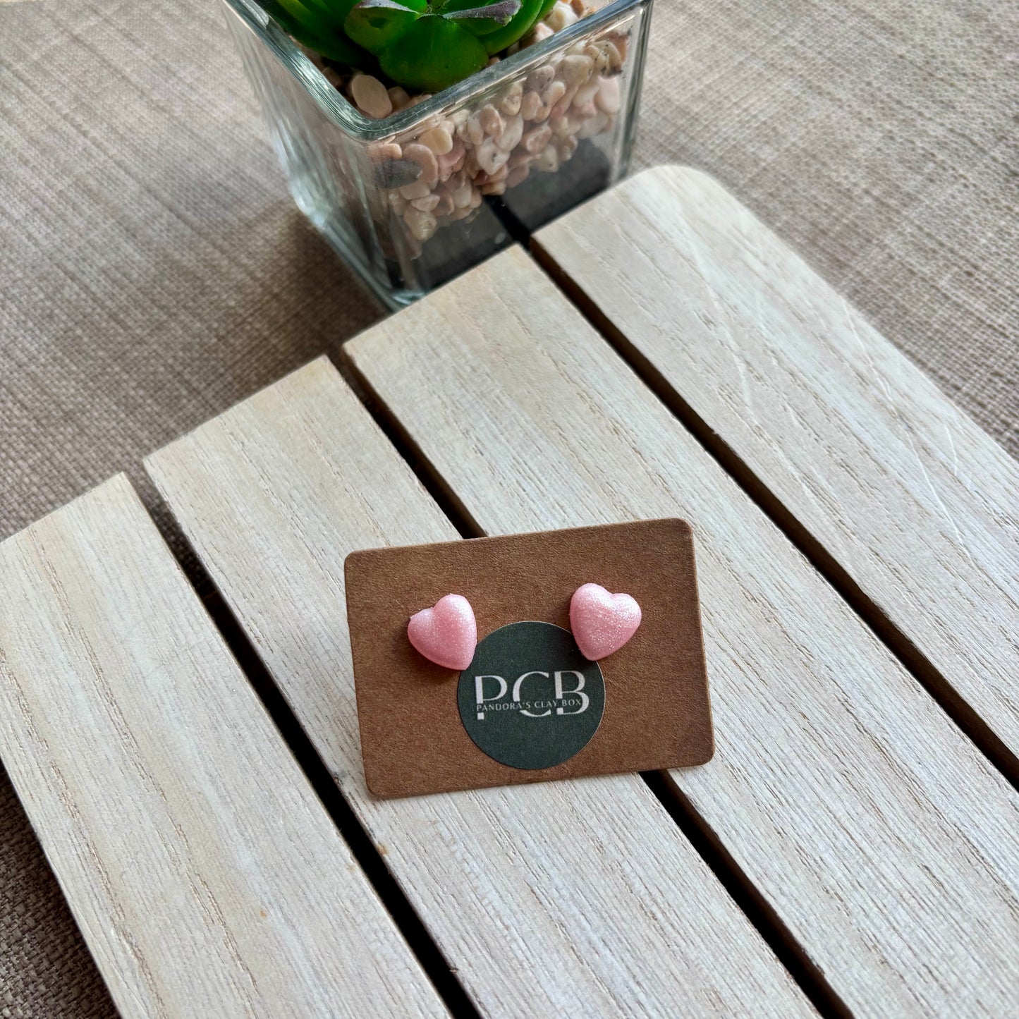 Pink heart studs