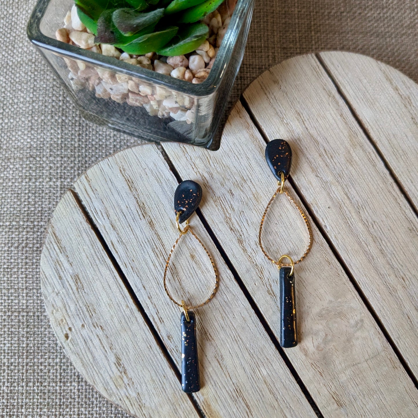 Black and gold drops