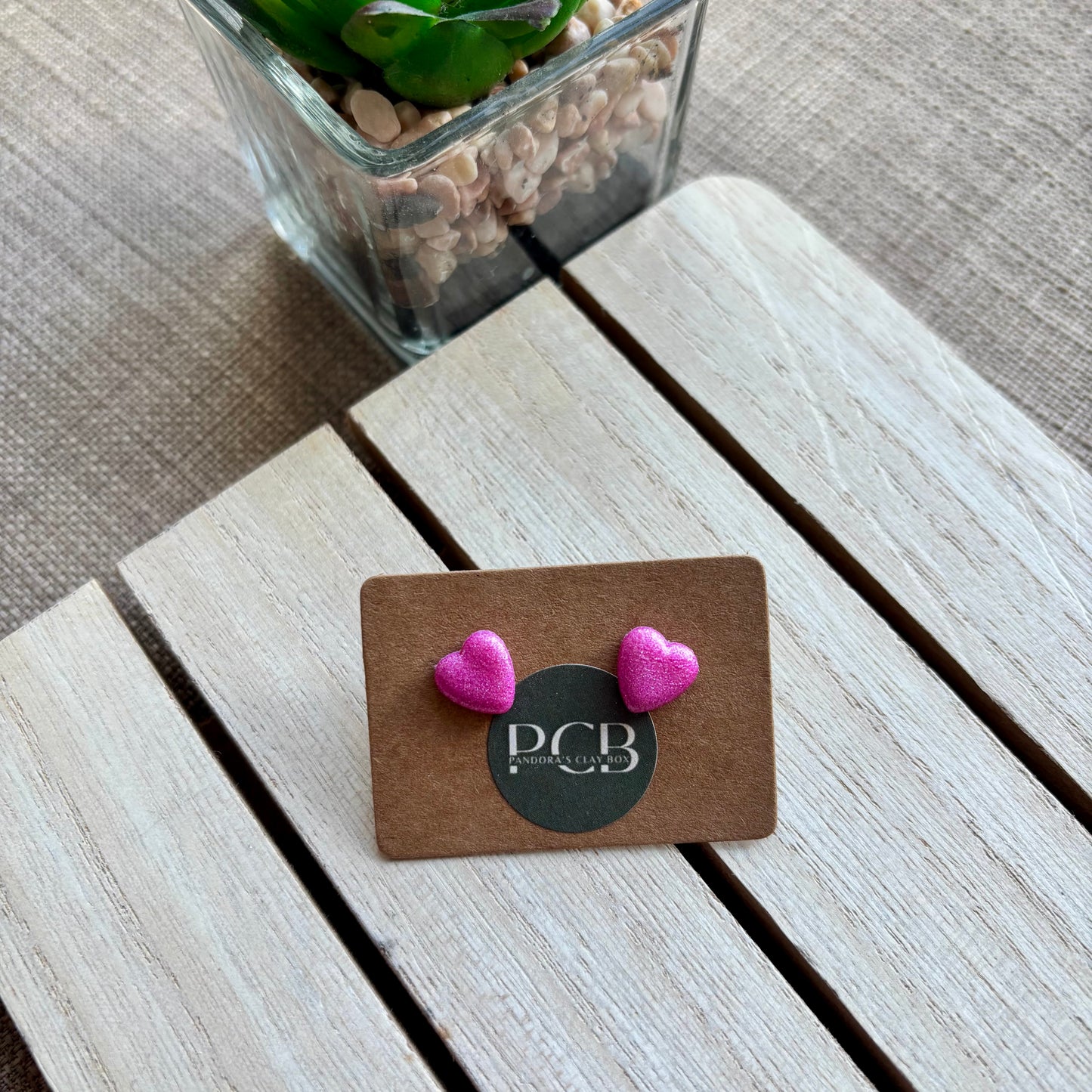 Pink heart studs