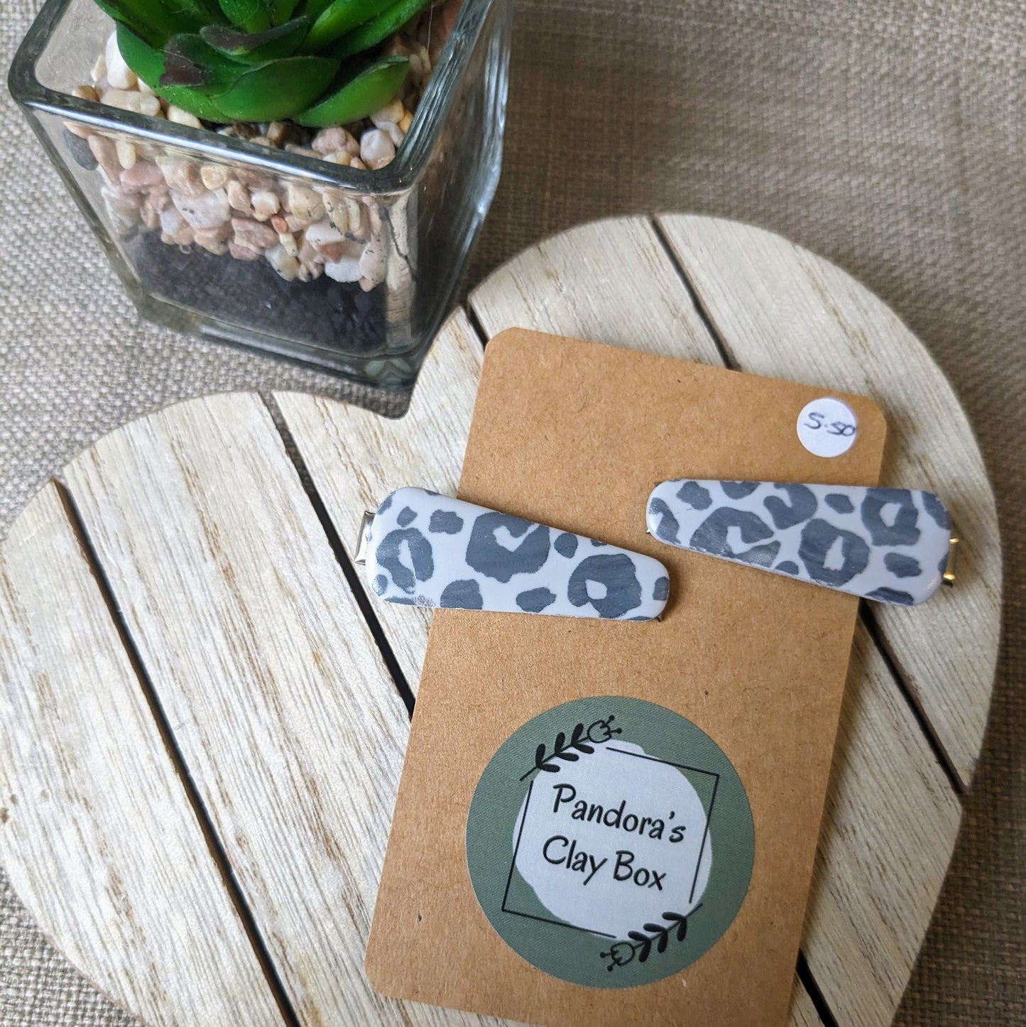 Grey leopard print slides
