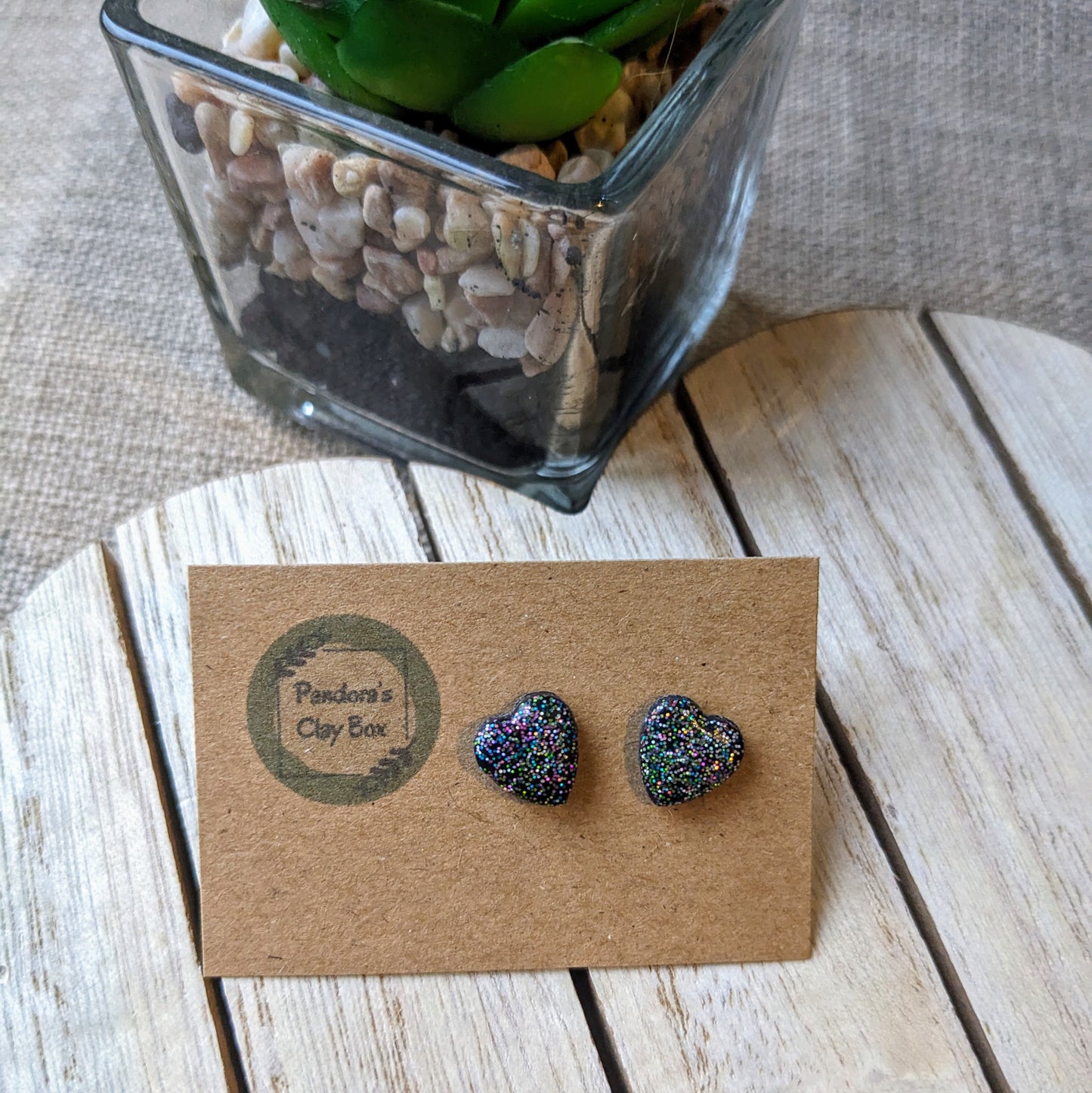 Black mixed glitter heart studs