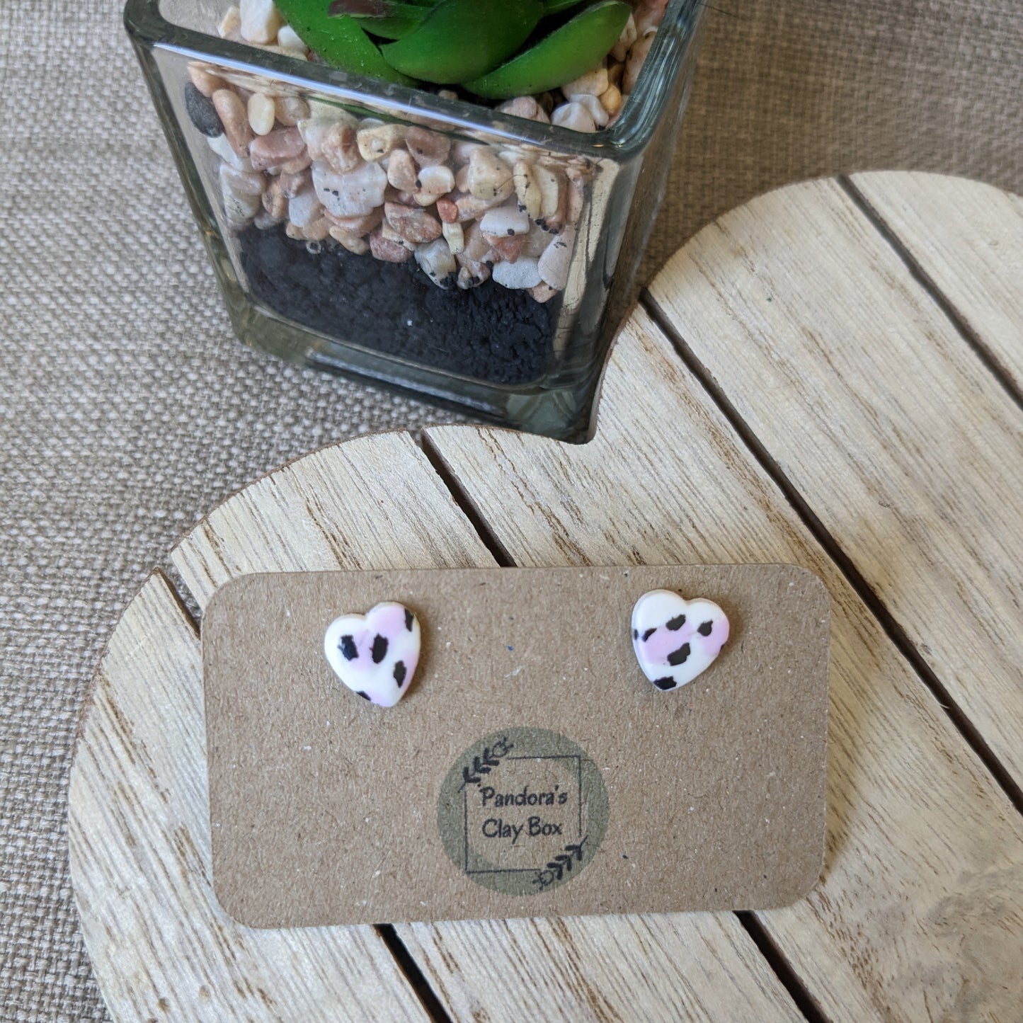 white/pink leopard heart studs