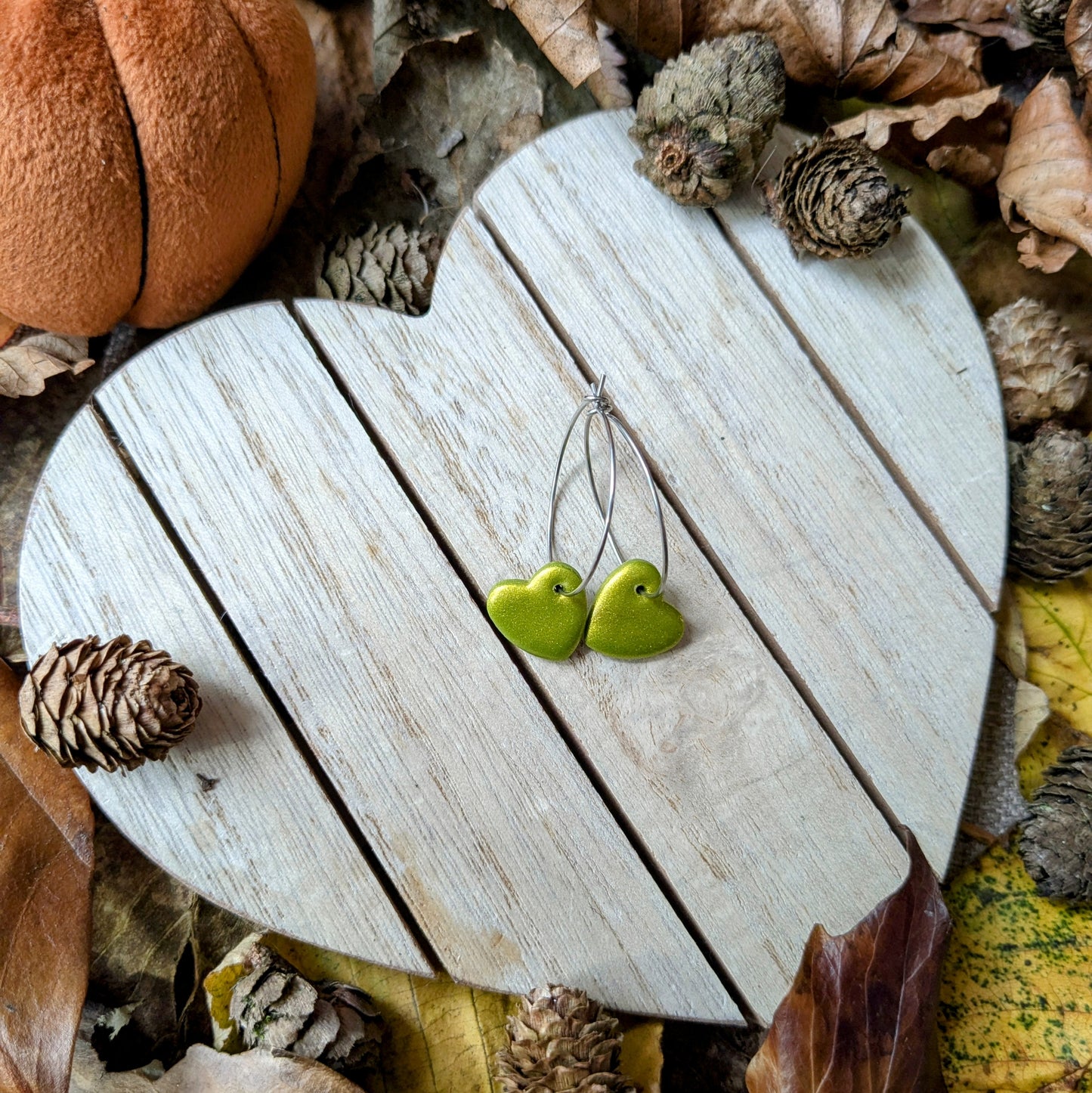 Metallic green heart hoops