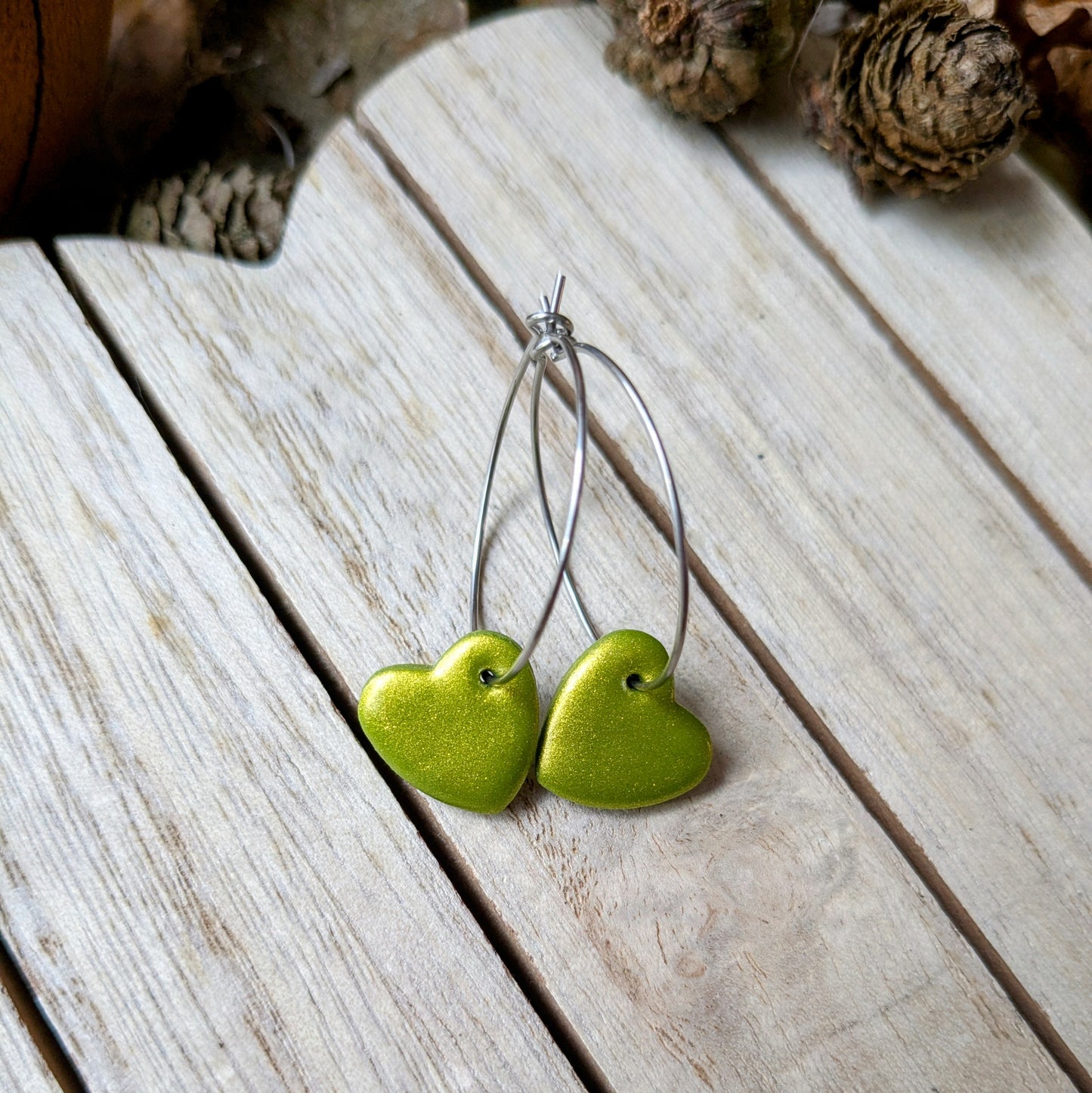 Metallic green heart hoops