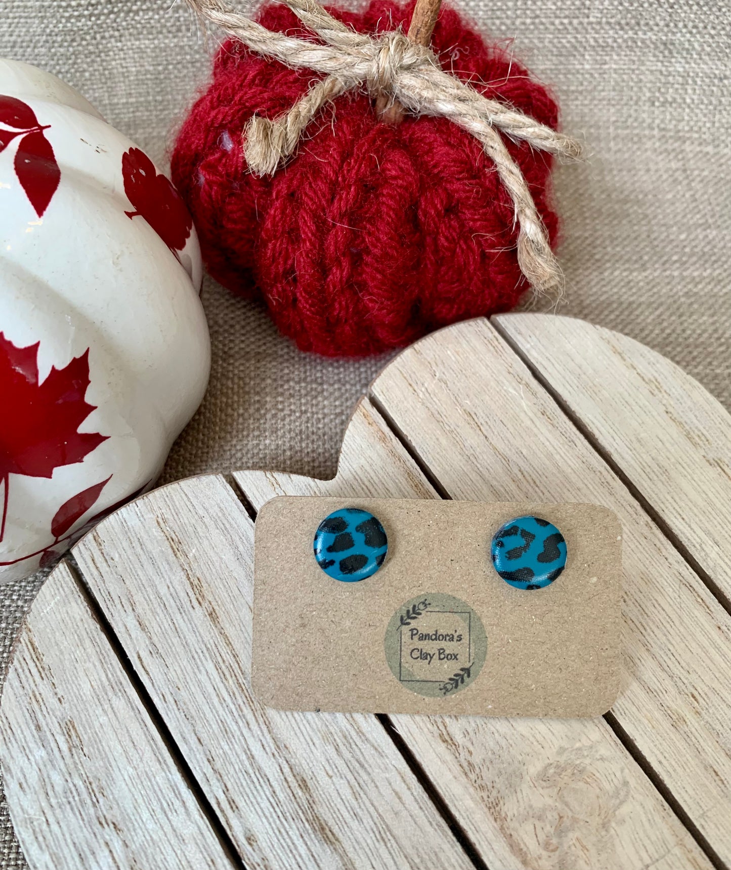 Teal leopard round studs