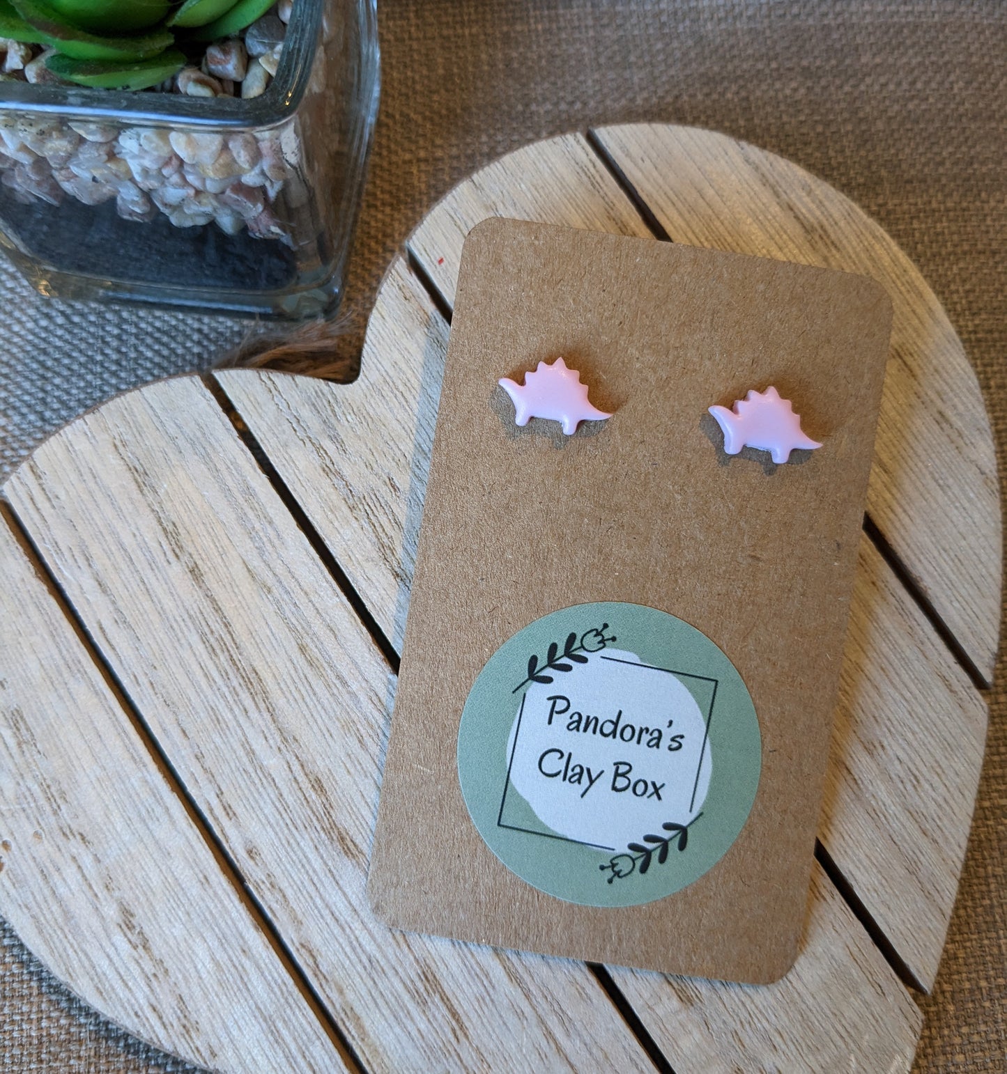 Pastel pink dino studs