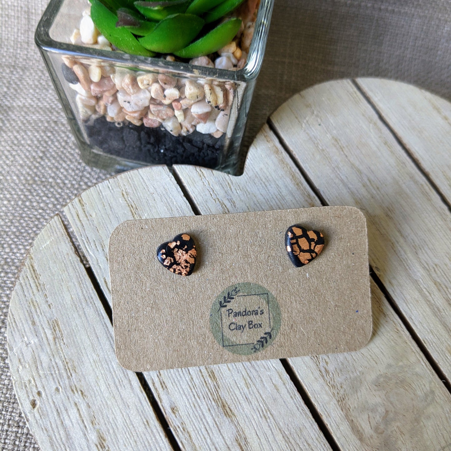 black/rose gold heart studs