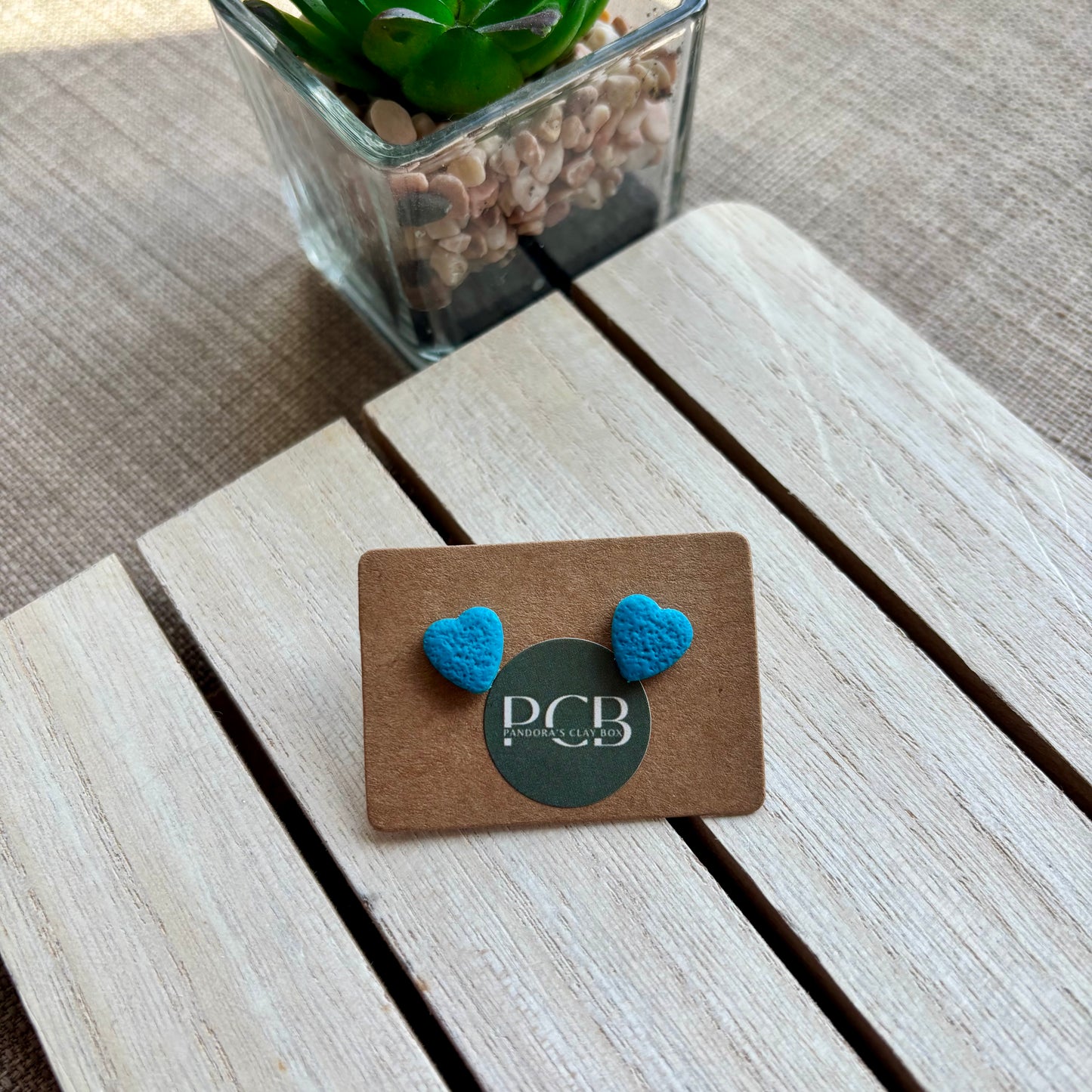 Teal heart studs