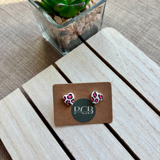 Pink leopard heart studs
