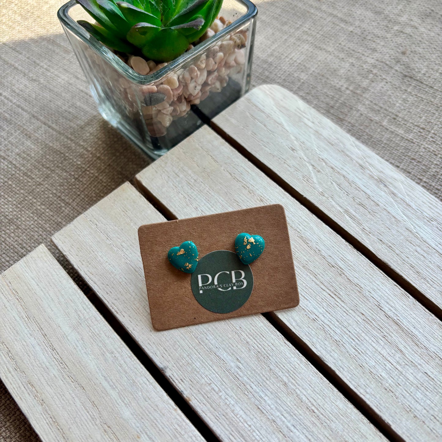 Green/gold heart studs