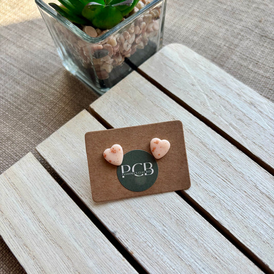 Nude/rose gold heart studs
