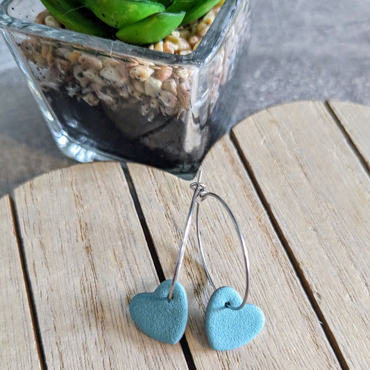 Silver outline ocean green heart hoops